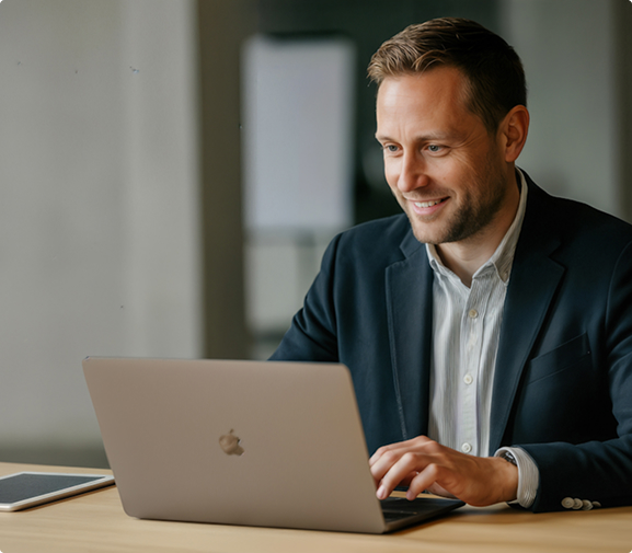 Business development leader working on a laptop